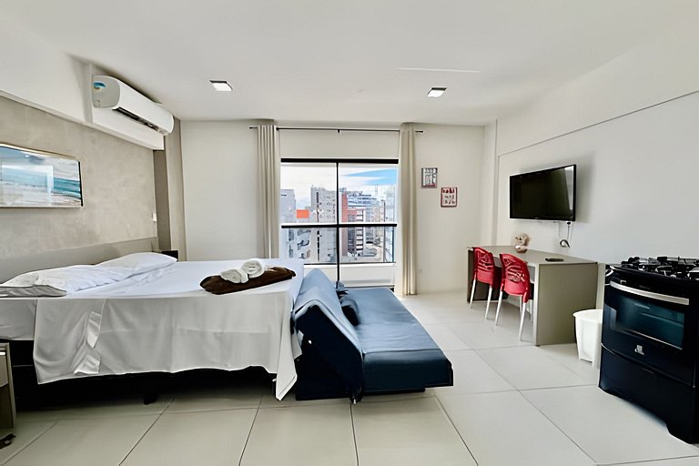 Loft com varanda 100 mt praia