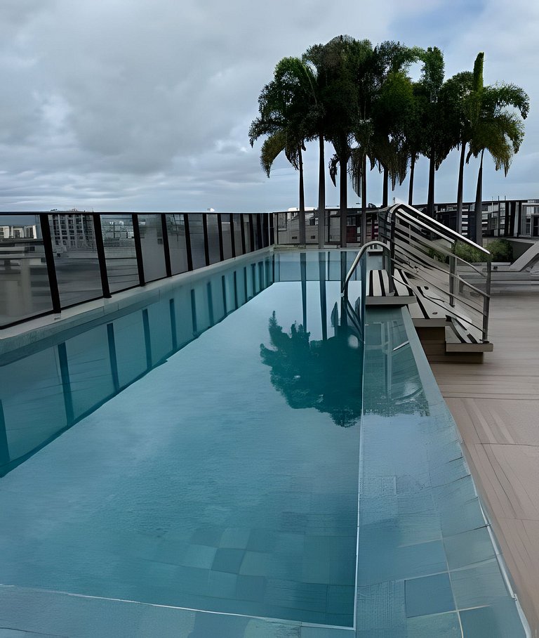 Loft com varanda 100 mt praia